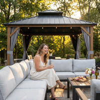12 Ft. X 16 Ft. Double Roof Hardtop Wood Grain Aluminum Patio Gazebo with Netting and Gray Curtains — Lifestyle